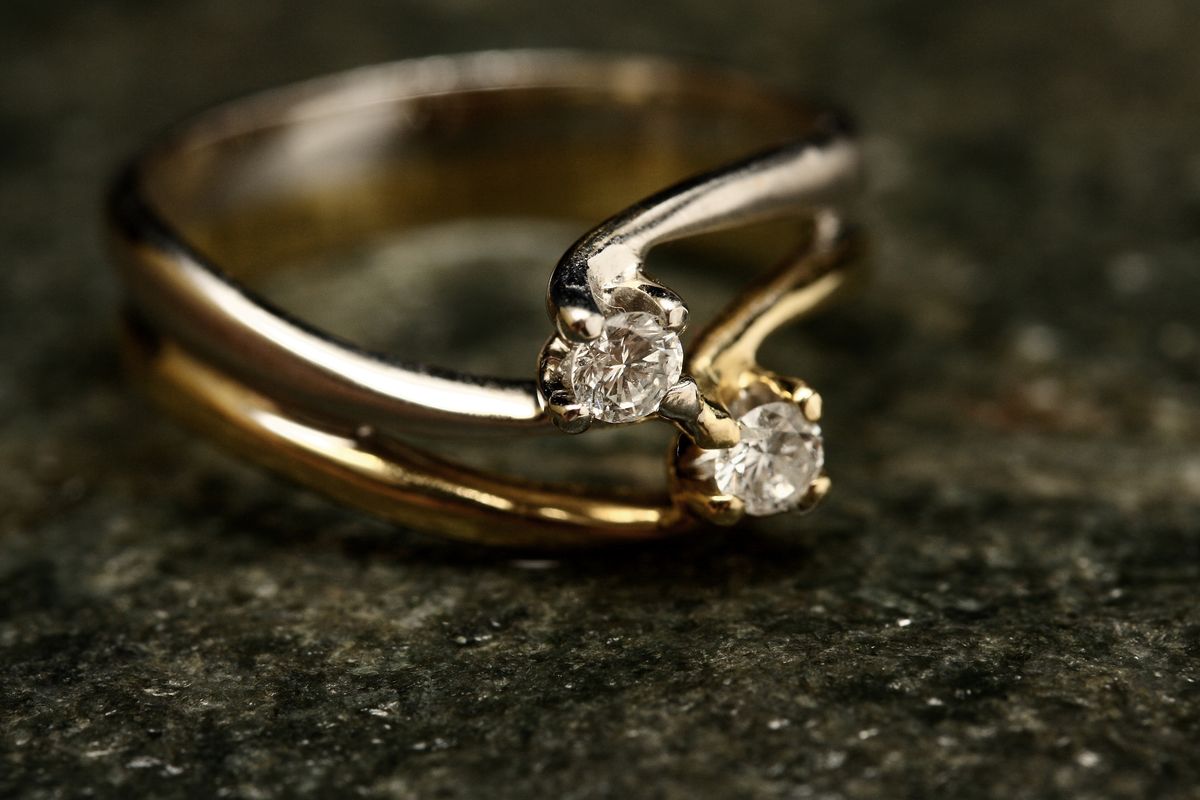 Gold jewellery with stones being valued together